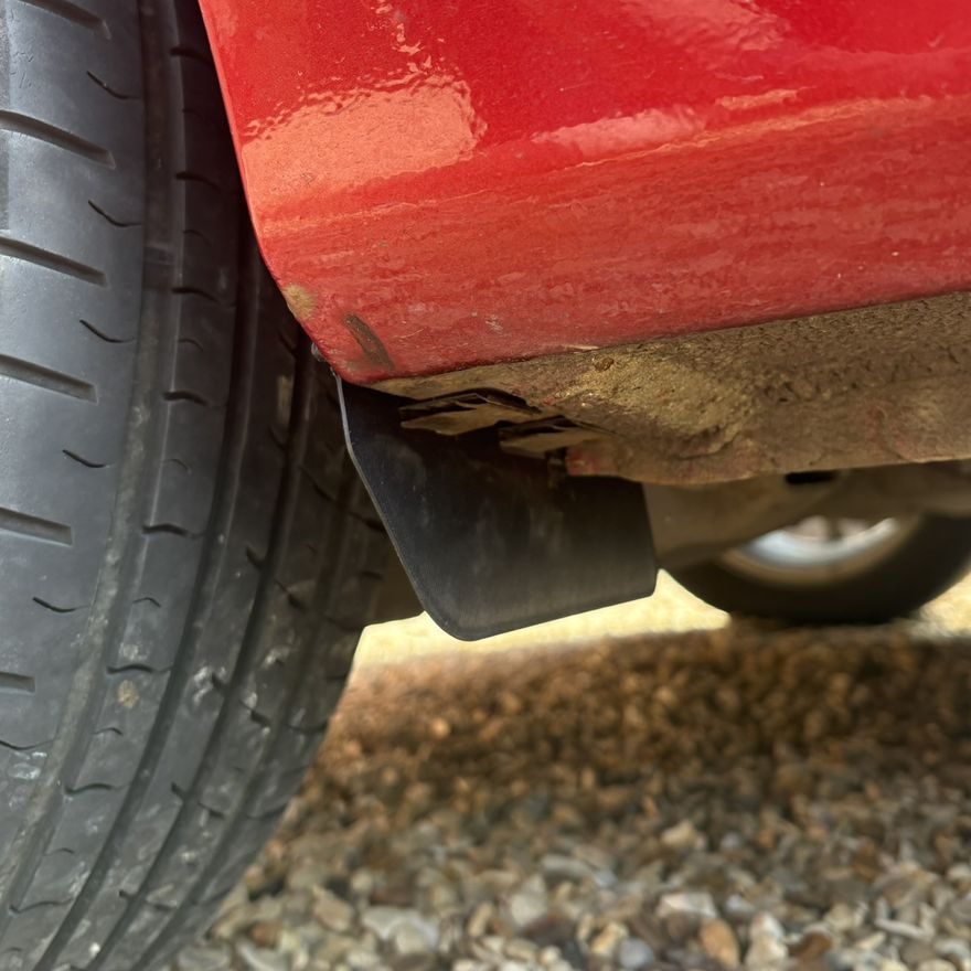 The final deflector printed in black ASA, fitted under the rear arch of the Fiesta